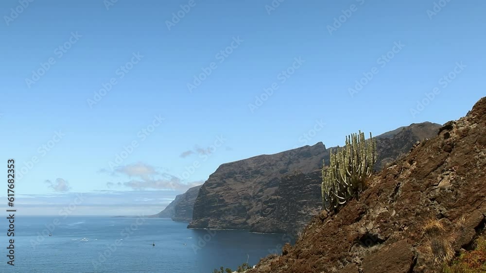 Los Gigantes Cliffs Tenerife Island with moving boats. Los Gigantes Cliffs Tenerife Island with moving boats.