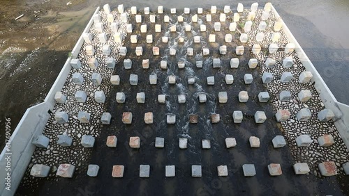 Wallpaper Mural Ecoulement de l'eau dans une passe à poissons sur la Têt à Perpignan, fish pass Torontodigital.ca