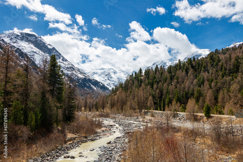 The river created by the Morteratsch Glacier flows through the Alpine valley