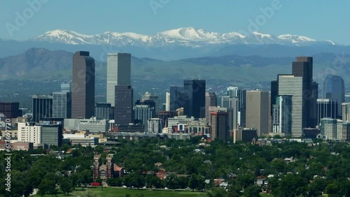 Downtown Denver aerial drone City Park cityscape Nuggets Avalanche Rockies Rocky Mountains landscape Mount Evans cinematic parallax foothills Colorado spring summer green lush circling left movement photo