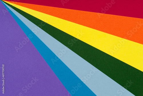 Abstract paper gradient background in bright colors. LGBT color festive background, rainbow colorful photo for bright design. Gay lesbian transgender background