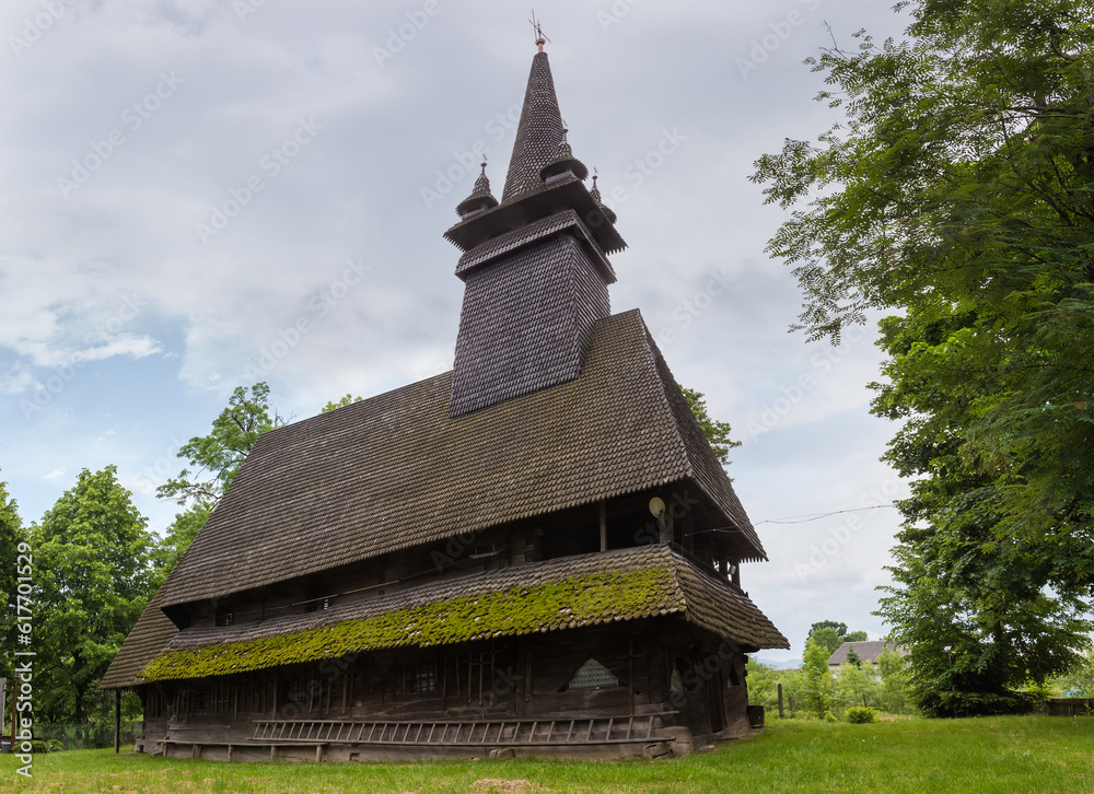 Gothic wooden church with tower in Sokyrnytsia village, Ukraine Gothic wooden church with tower in Sokyrnytsia village, Ukraine