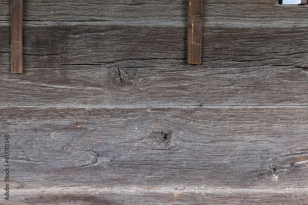 Obraz premium Fragment of the wall of the wooden medieval church