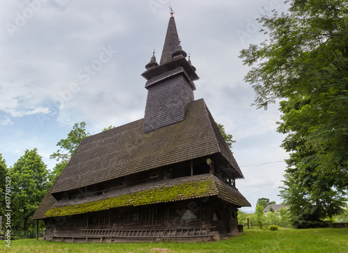 Gothic wooden church with tower in Sokyrnytsia village, Ukraine