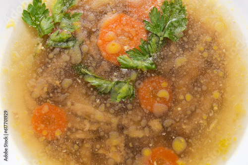 Chicken jelly in the white bowl, top view close-up photo