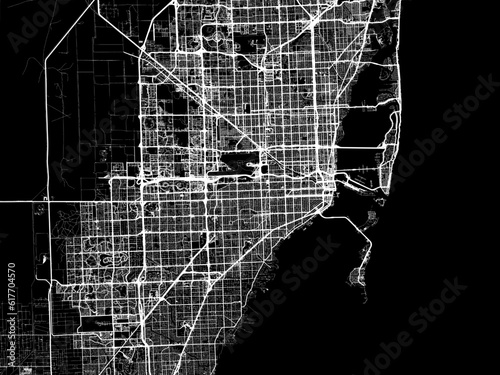 Vector road map of the city of  Miami Florida in the United States of America with white roads on a black background.