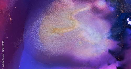 Shiny neon magenta purple paint abstract background. Shining particles in bright blue pink fluid ink. Vivid lilac color liquid texture. Bright fuchsia shimmering flowing pattern. Watercolor wallpaper