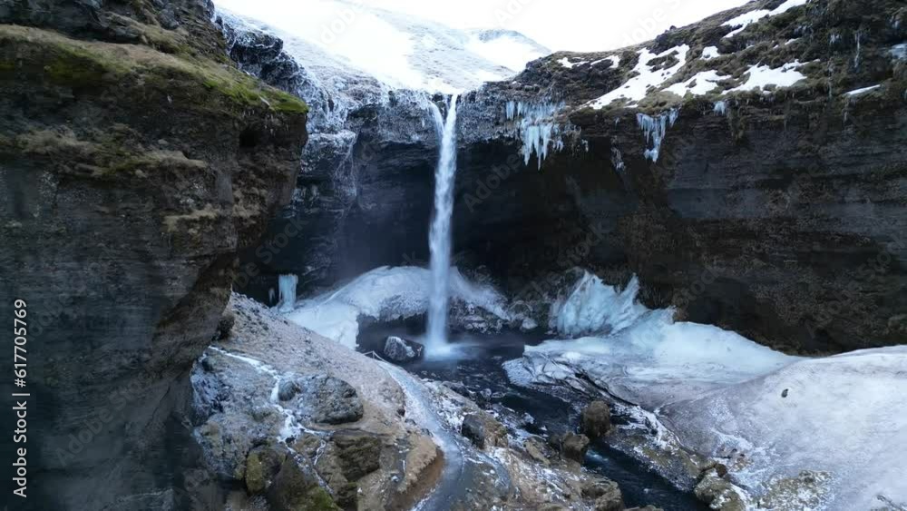 Scenic view of Kvernufoss frozen waterfall in the south coast of Iceland Scenic view of Kvernufoss frozen waterfall in the south coast of Iceland