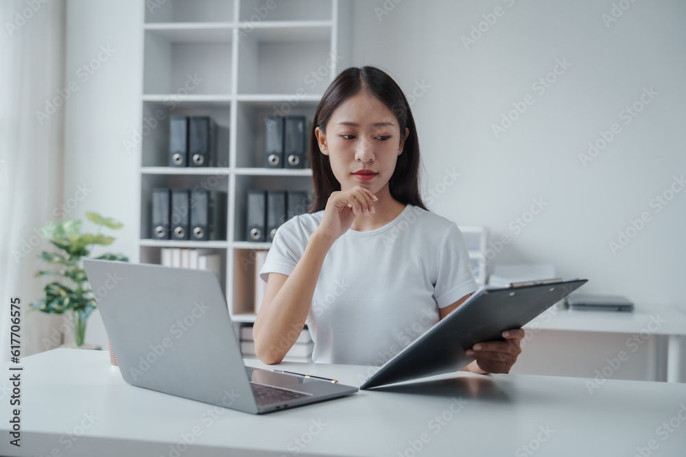 Young Asian woman university student satisfied with learning english language during online courses via laptop computer, learning online with webinar, video tutorial, internet lessons