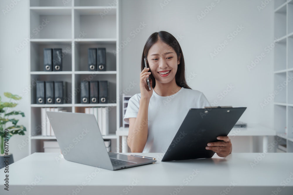 Young Asian woman university student satisfied with learning english language during online courses via laptop computer, learning online with webinar, video tutorial, internet lessons Young Asian woman university student satisfied with learning english language during online courses via laptop computer, learning online with webinar, video tutorial, internet lessons