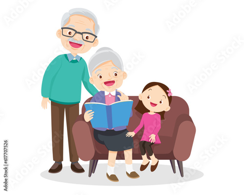 grandparents reading book with granddaughter