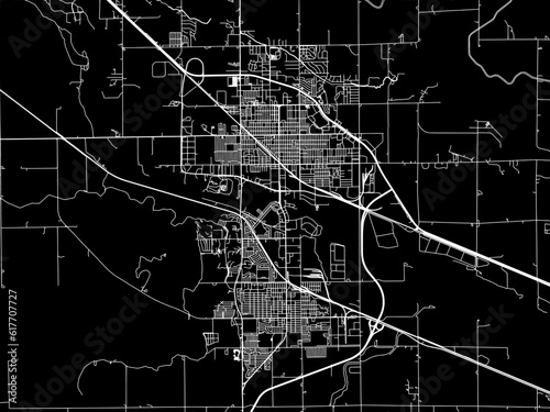 Vector road map of the city of  Scottsbluff Nebraska in the United States of America with white roads on a black background. photo