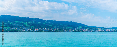 Obraz na płótnie Switzerland, XXL panorama view to rohrschach city houses buildings from lakeside at bodensee lake constance water view with sun w salonie