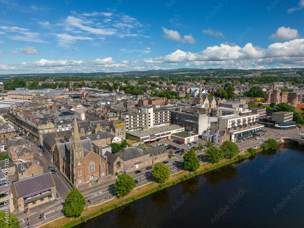 An aerial drone photo of the town centre in Inverness and the river Ness which goes through the town in Scotland.