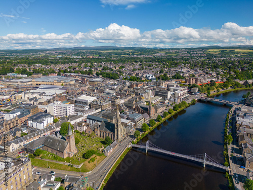 An aerial drone photo of the town centre in Inverness and the river Ness which goes through the town in Scotland. © robin