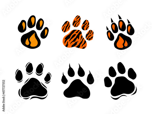 Paw prints set. World tiger day. Wildlife, tiger paw prints. Vector animal prints silhouette, isolated illustration for animal protection theme, homeless animal shelters. World wildlife day.