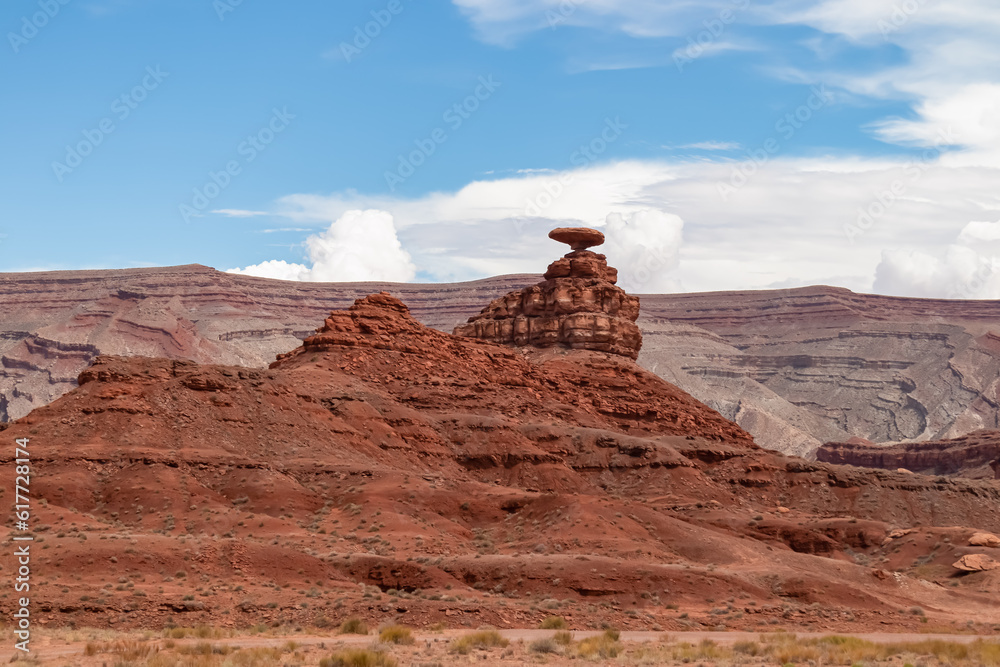 Scenic view of the sombrero shaped rock formation of Mexican Hat on the San Juan River on the northern edge of the Navajo Nations borders in south central San Juan County, Utah, USA