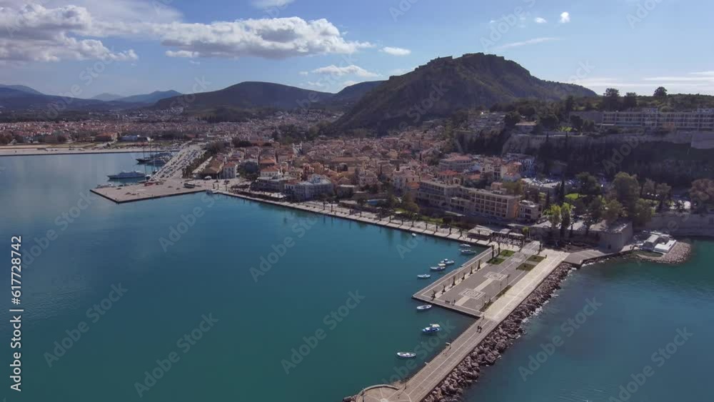 Drone view over a harbor surrounded by buildings in Nafplion, Greece Drone view over a harbor surrounded by buildings in Nafplion, Greece