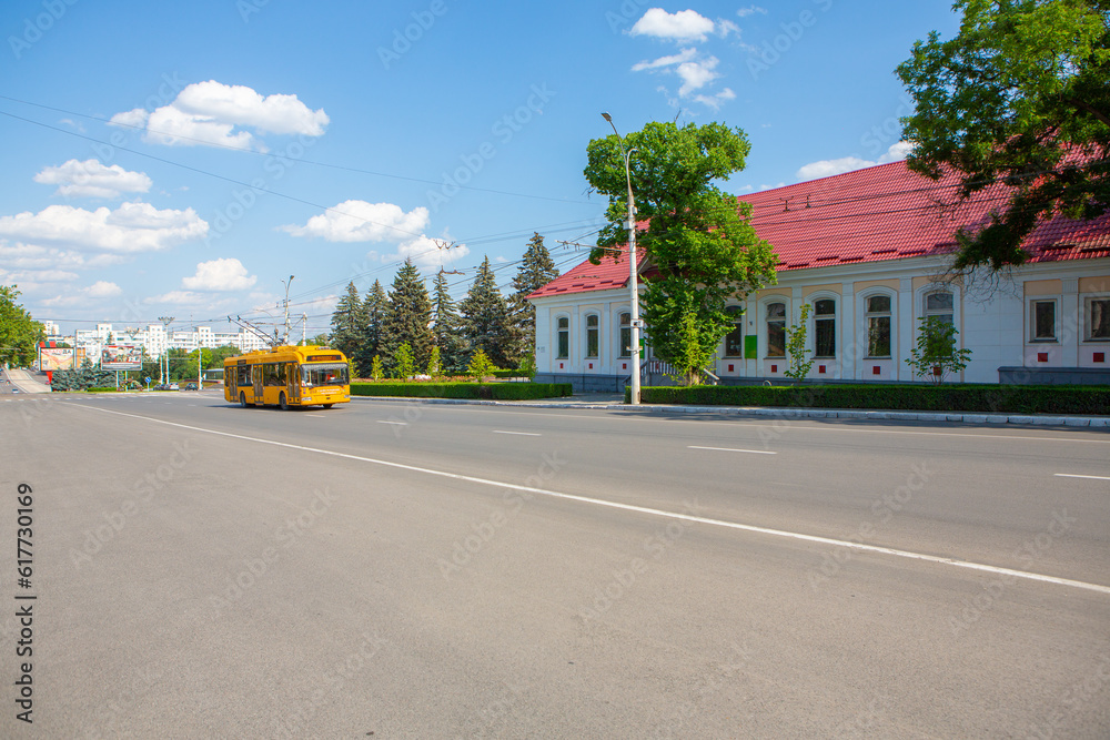 Obraz na płótnie A beautiful and clean street inTiraspol, Transnistria or Moldova, on a sunny summer day. w salonie