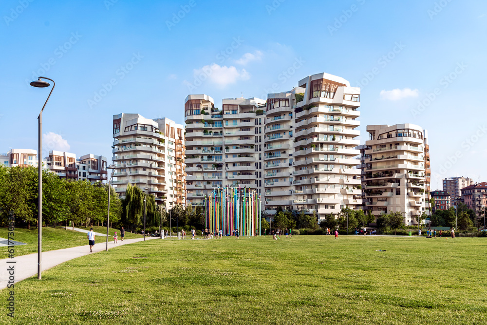 Libeskind Residences, houses designed by Daniel Libeskind, with park and sculpture of a cat in foreground, in the south-west part of the stylish CityLife area, Milan, Italy