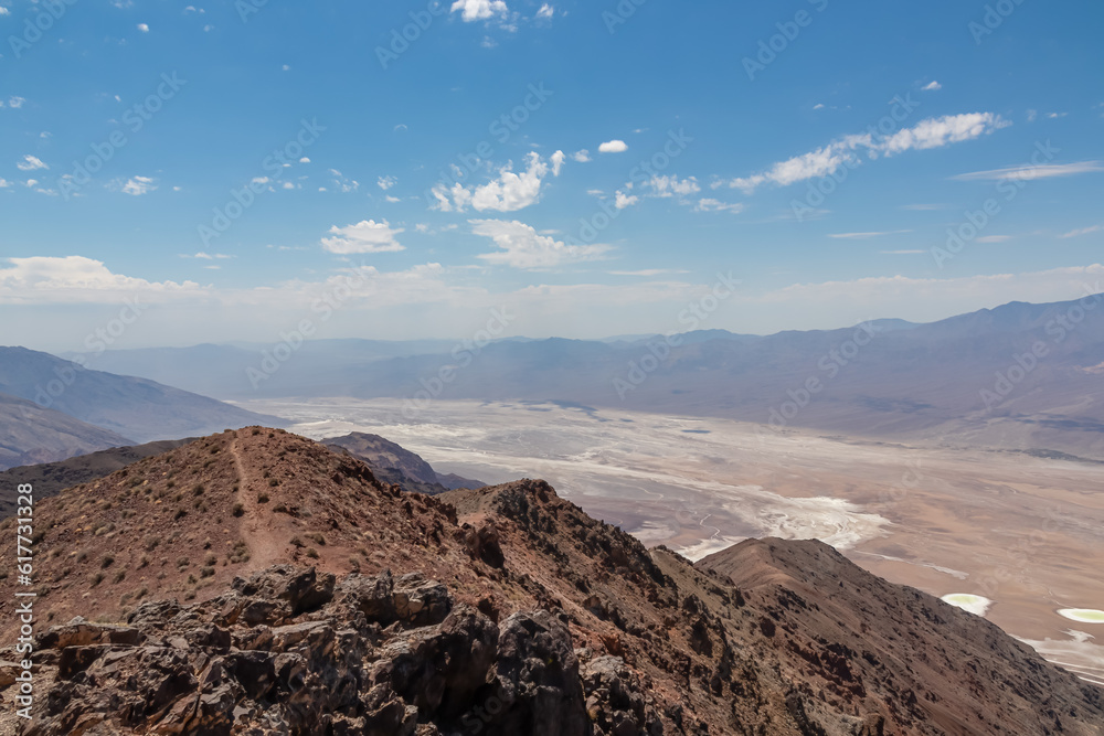 Scenic view of Salt Badwater Basin and Panamint Mountains seen from Dante View in Death Valley National Park, California, USA. Coffin Peak, along crest of Black Mountains, overlooking desert landscape