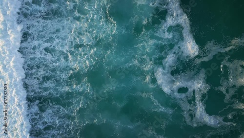 Aerial view over foamy waves in Gold Coast, Australia