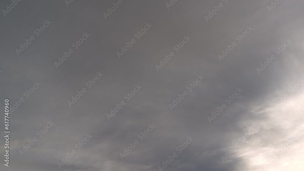Gray clouds turn even darker and cover the sunset Gray clouds turn even darker and cover the sunset