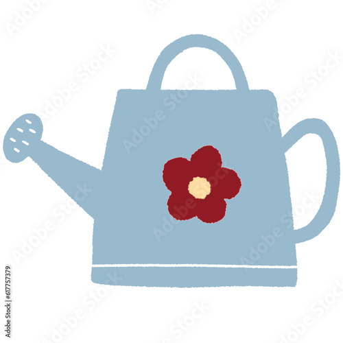 blue watering can with flowers