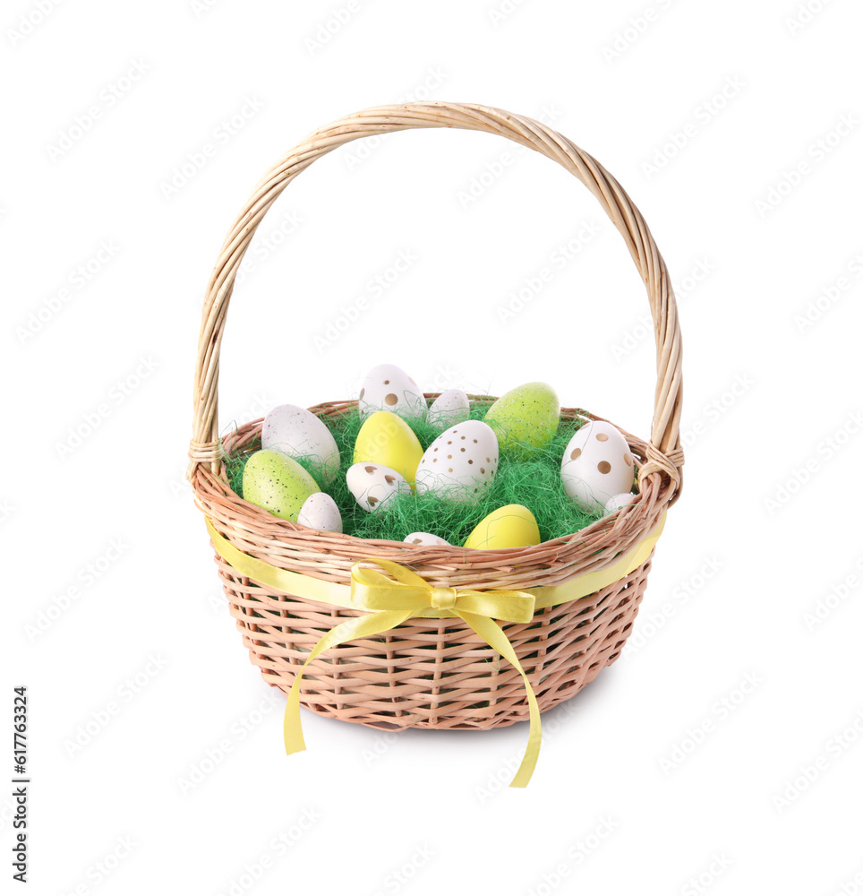Wicker basket with beautifully painted Easter eggs isolated on white Wicker basket with beautifully painted Easter eggs isolated on white