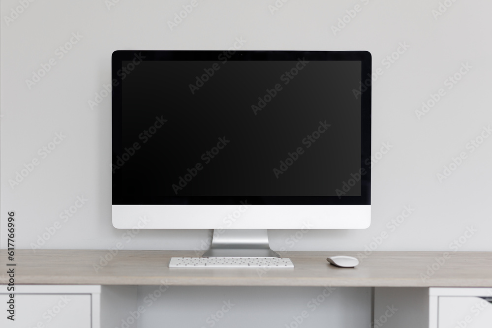 Computer with blank screen on the table Computer with blank screen on the table