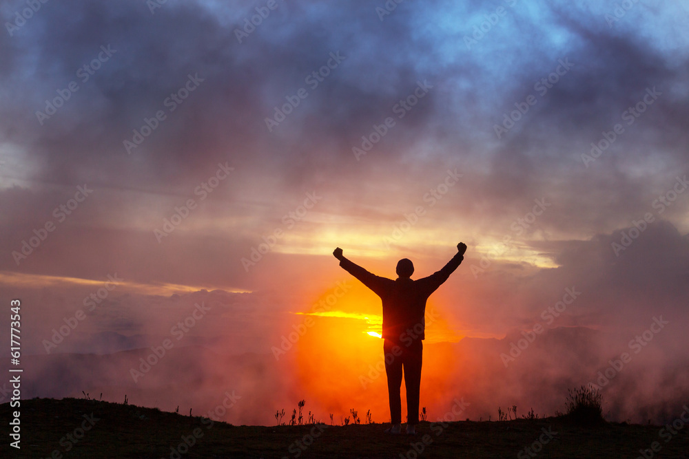 Happy man on sunset