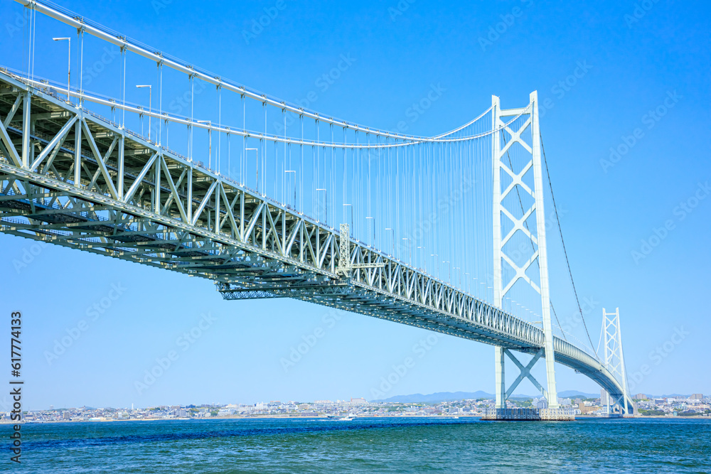 淡路島から見た初夏の明石海峡大橋 兵庫県淡路市 Akashi Kaikyo Bridge in early summer seen from Awaji Island. Hyogo Pref, Awaji City. 淡路島から見た初夏の明石海峡大橋 兵庫県淡路市 Akashi Kaikyo Bridge in early summer seen from Awaji Island. Hyogo Pref, Awaji City.