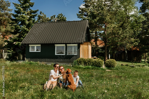 Obraz na płótnie Family with Dog Having Fun Together Outdoors w salonie