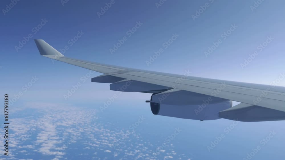 Airplane flight above the clouds in 4K slow motion 60fps Airplane flight above the clouds in 4K slow motion 60fps