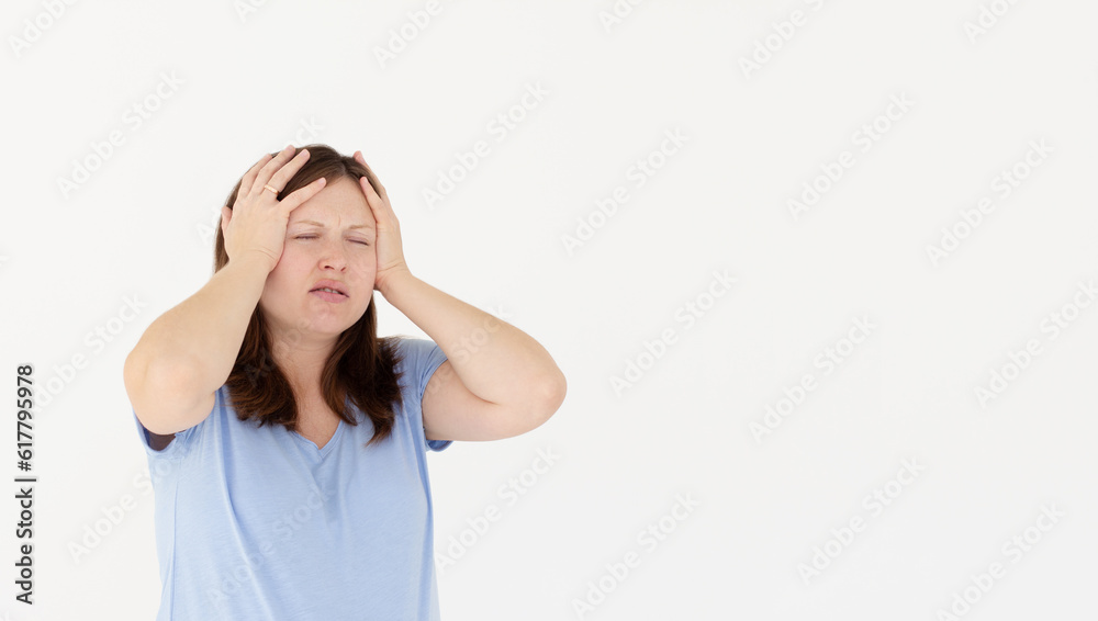 Exhausted pregnant woman touching her head with eyes closed. Female exchange worker suffering from unbearable headache. Health concept Exhausted pregnant woman touching her head with eyes closed. Female exchange worker suffering from unbearable headache. Health concept