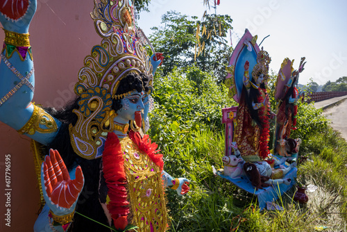 Photography Lost Devotion: Abandoned Idols of Kali After Puja at Roadside