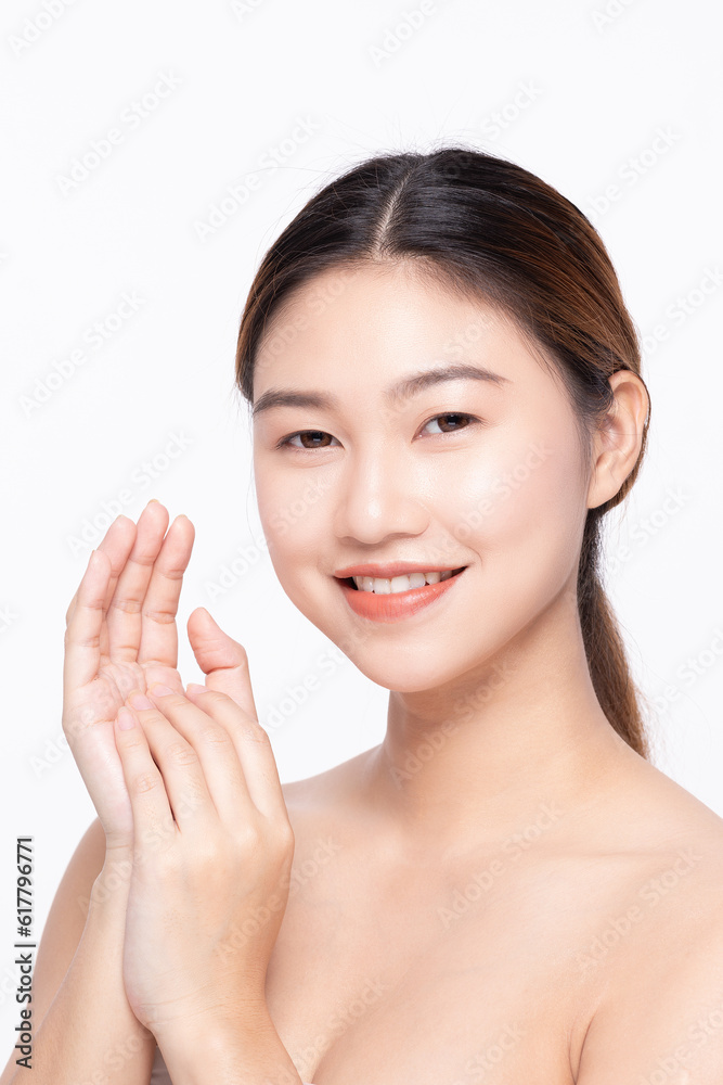 Beautiful Asian woman touching soft cheek smile with clean and fresh skin Happiness and cheerful with positive emotional,isolated on white background,Beauty Self Care and Cosmetics Concept