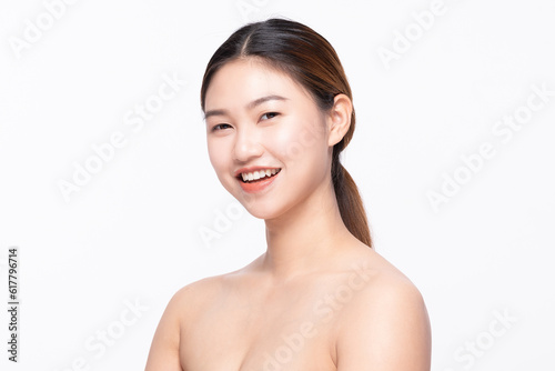 Beautiful Asian woman touching soft cheek smile with clean and fresh skin Happiness and cheerful with positive emotional,isolated on white background,Beauty Self Care and Cosmetics Concept