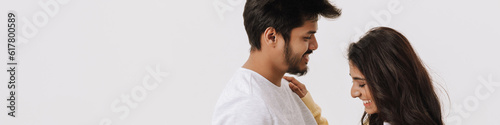 Young indian couple laughing while posing together