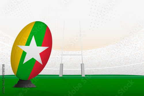 Myanmar national team rugby ball on rugby stadium and goal posts, preparing for a penalty or free kick.