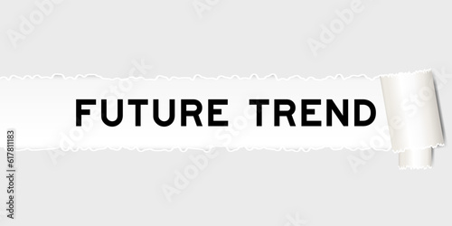 Ripped gray paper background that have word future trend under torn part