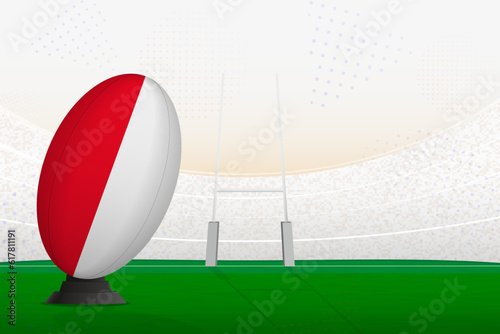 Monaco national team rugby ball on rugby stadium and goal posts, preparing for a penalty or free kick.