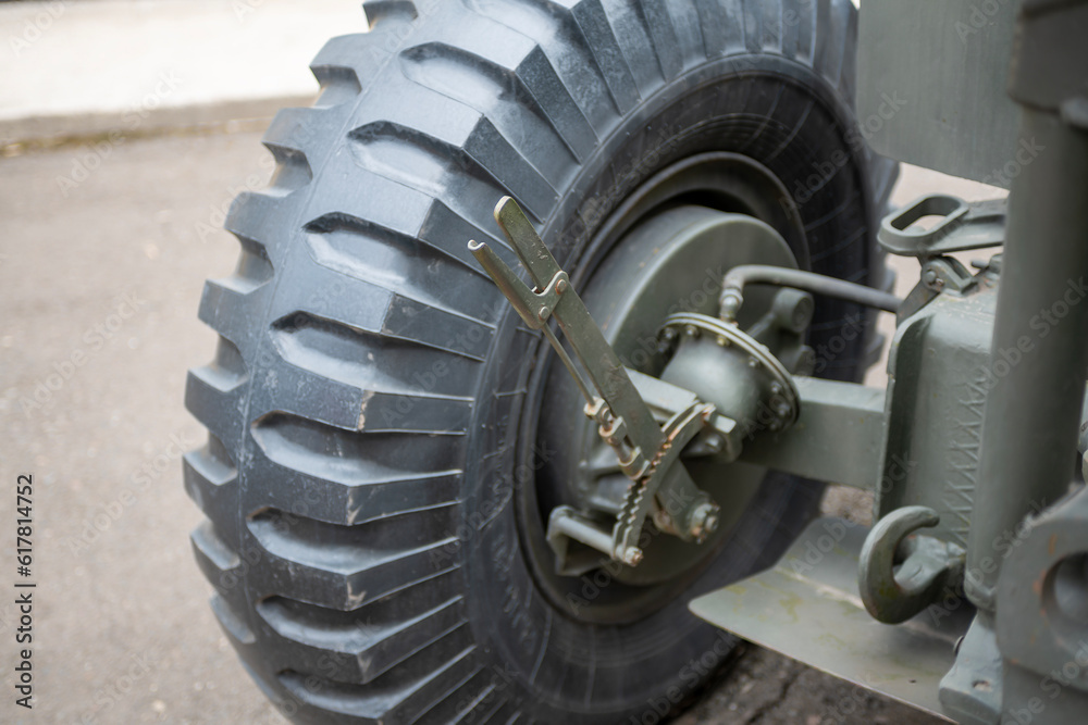Big black wheel of military equipment.