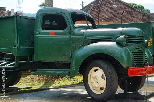 Portrait of an old dark green truck in the museum collection at Palagan Ambarawa. Indonesia