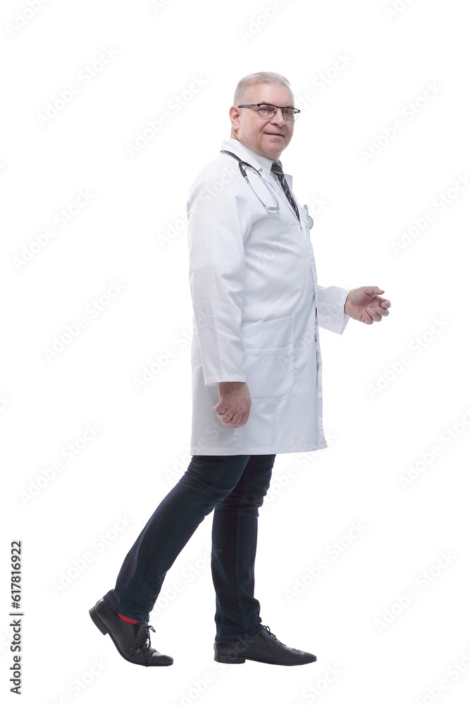 side view. smiling doctor walking to help. side view. smiling doctor walking to help.