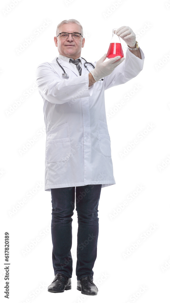 in full growth. a smiling doctor with a laboratory flask in full growth. a smiling doctor with a laboratory flask