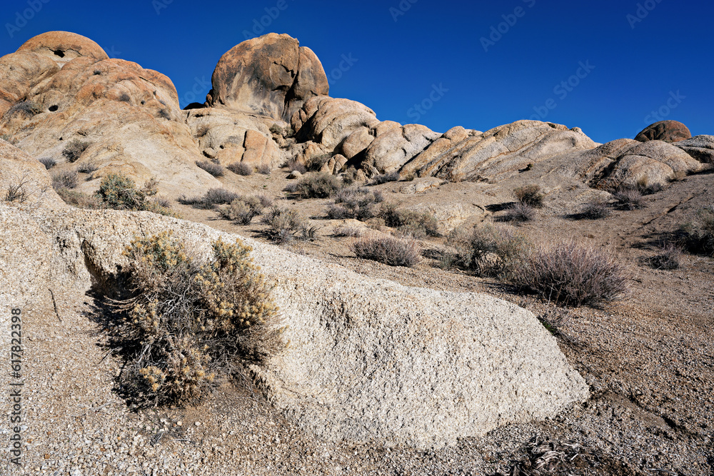 Captivating California landscape with rocky terrain and serene sky, devoid of people.