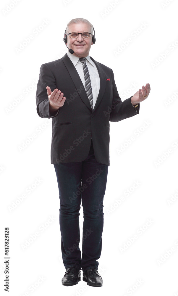 in full growth. Mature business man in a headset. in full growth. Mature business man in a headset.