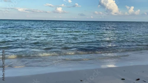 Calm sea weaves beach in Mexico
