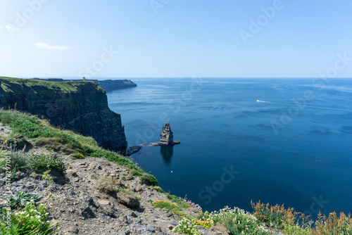 Panoramic view of Cliffs of Moher on a sunny day in Burren, Ireland